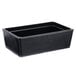 A black rectangular Cal-Mil faux slate ice housing on a counter.
