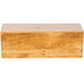 A wooden rectangle plate riser with a rustic finish.