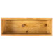 A wooden rectangle plate riser with a rustic wood surface.