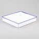 A white rectangular melamine tray with a blue rim.