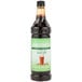 A Monin 1 liter bottle of iced coffee concentrate.