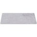 A rectangular white faux cement serving platter.