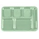 a white wall with a light green background