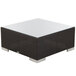 A square BFM Seating Aruba Java wicker coffee table with a glass top.