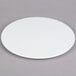 An Elite Global Solutions white melamine plate on a gray surface.