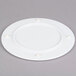 A white Elite Global Solutions melamine plate with three holes.