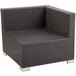A brown wicker BFM Seating Aruba armchair with silver legs.