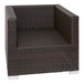 A brown wicker BFM Seating Aruba armchair with left and right armrests.