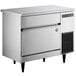 A stainless steel Hoshizaki undercounter ice machine with a vent on it.