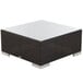 A square BFM Seating Aruba wicker coffee table with a glass top.