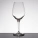 A clear Spiegelau Authentis wine tasting glass on a table.