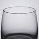 A close up of a clear Spiegelau Vino Grande Rocks Glass with a black rim.