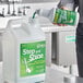 A white Noble Chemical container with a green label.