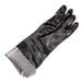 A pair of long black PVC gloves with a cotton lining.