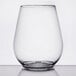 A close-up of a clear Fineline stemless wine goblet.