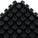 A close up of a Garde push block with a square pattern.