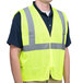 A man wearing a Cordova Lime high visibility safety vest.