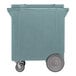 A slate blue mobile ice bin with large rear wheels and smaller front casters.