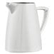 A Vollrath stainless steel creamer with a silver handle.