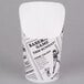 An American Metalcraft paper French fry cup with black and white images on it.