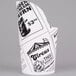 An American Metalcraft white paper French fry cup with black and white circus-themed images.