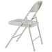 A gray metal National Public Seating Commercialine folding chair.