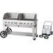 A Crown Verity 60" mobile outdoor grill with cart, wheels, and propane tanks.