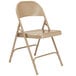 A beige National Public Seating metal folding chair.