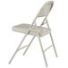 A National Public Seating gray metal folding chair.