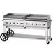 A Crown Verity stainless steel outdoor griddle on wheels.