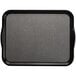 A black rectangular Cambro tray with a black handle.