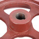 A red Avantco Initiative Axle assembly wheel with a hole in the center.