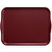 A burgundy rectangular Cambro tray with white handles.