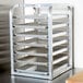A Channel countertop rack with 7 trays on it.