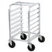 A Channel metal sheet pan rack on four black wheels.