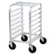 A Channel metal sheet pan rack with four black wheels.