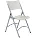 A gray steel folding chair with a speckled gray plastic back and seat.