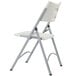 A gray steel folding chair with a speckled gray plastic seat and back.