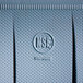 A blue plastic bag with the NSF logo on a table.
