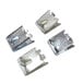 Four silver metal clips on a white background.