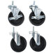 A set of four Master-Bilt swivel stem casters with black rubber wheels.