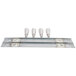 A set of four stainless steel Master-Bilt refrigeration equipment legs.