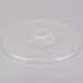 A clear plastic lid with a circular base.