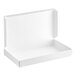 A white 1 lb. candy box with an open lid.