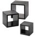 A group of black cube-shaped display risers.