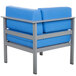 A BFM Seating Belmar soft gray aluminum outdoor armchair with a blue cushion and right armrest.