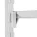 A white plastic bracket for Cambro Camshelving.