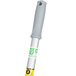 A grey tube with a yellow stick and green and white label.
