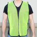 A man wearing a yellow safety vest.