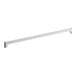 A white metal bar with a long handle.
